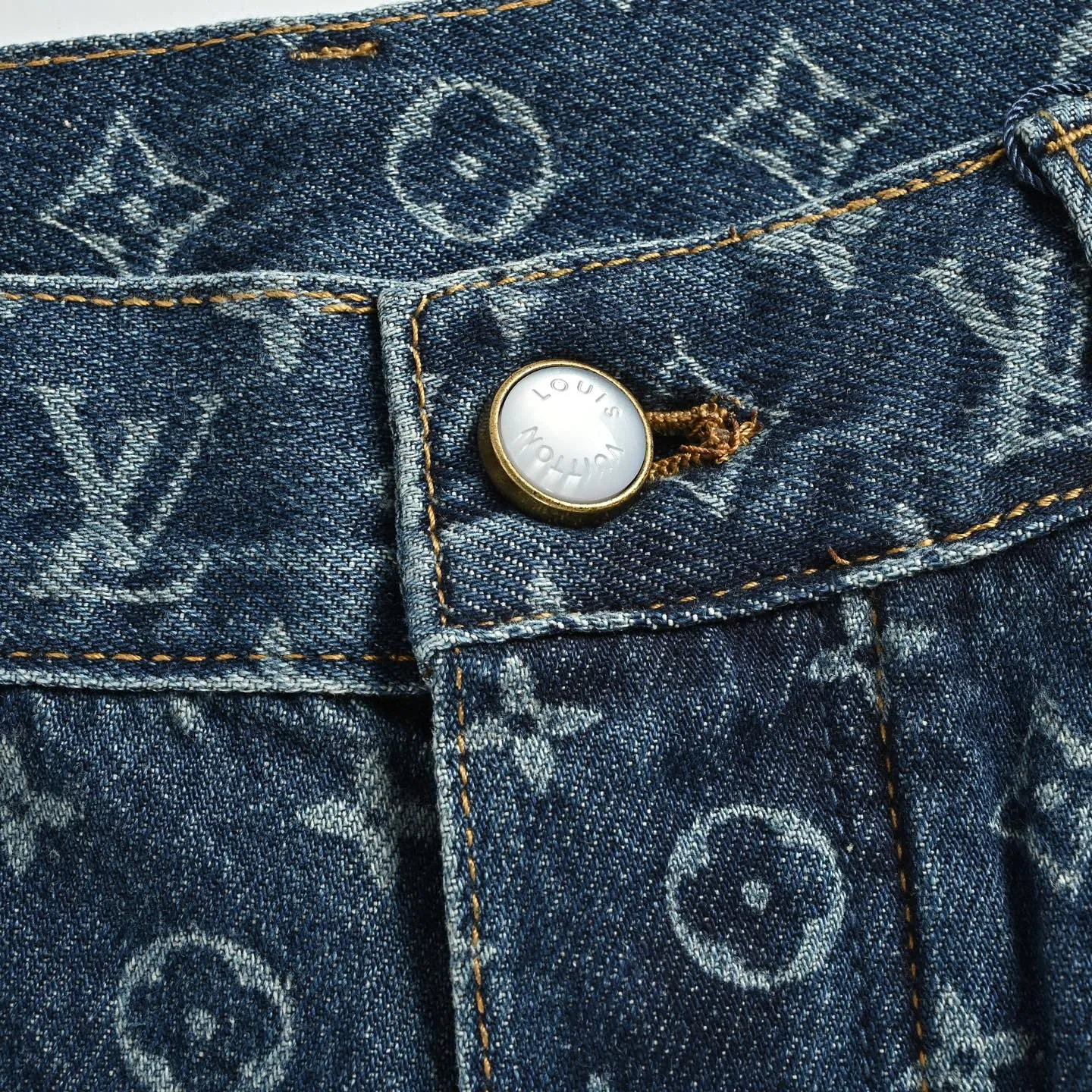 Louis Vuitton/Louis Vuitton all-over logo daisy embroidered jeans